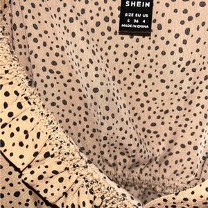 Light brown black spotted tank top, smoke free home! Size small